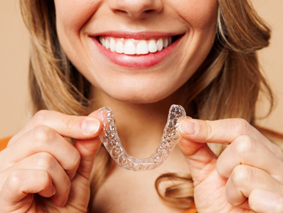 Patient in Barker Road Brookfield smiling with Invisalign
